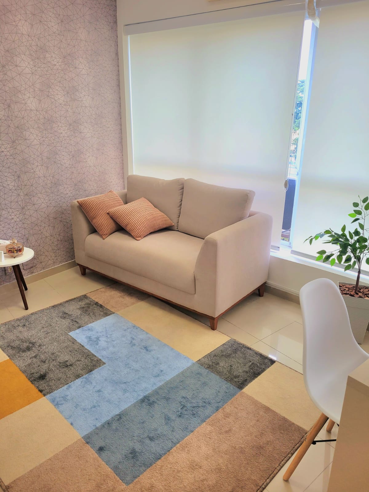 Sala de atendimento sofá bege
